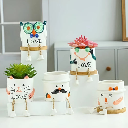 Ceramic desktop flowerpot with hanging foot design and cartoon decoration for succulent plants
