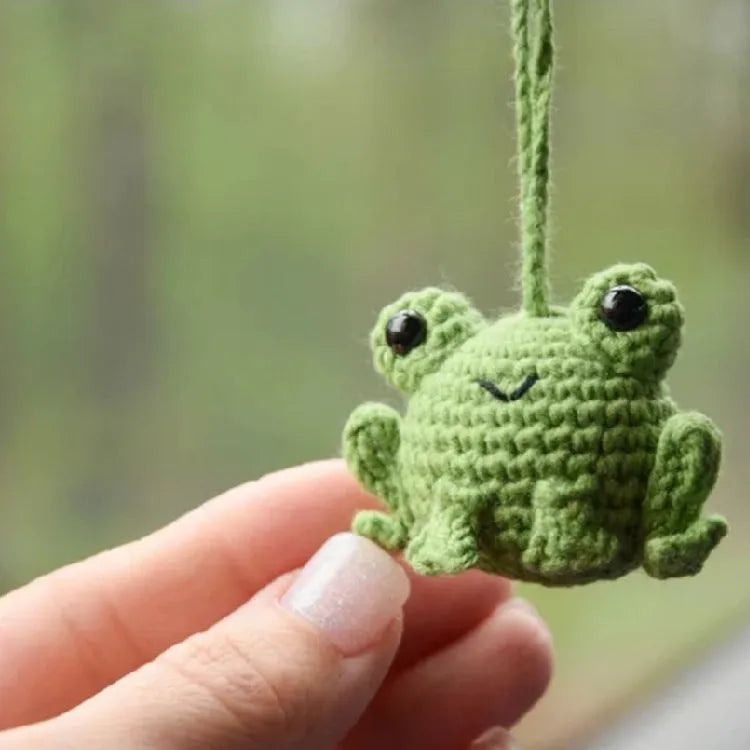 Handmade woven plush frog car pendant measuring 5cm wide by 5cm high by 15cm long