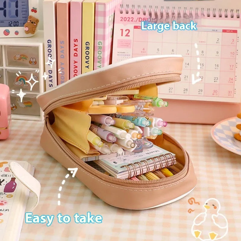 Transparent PVC pencil case with Korean cartoon pattern in vertical orientation