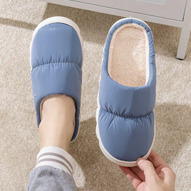 Blue plush indoor slippers with thick rubber sole and artificial fur lining