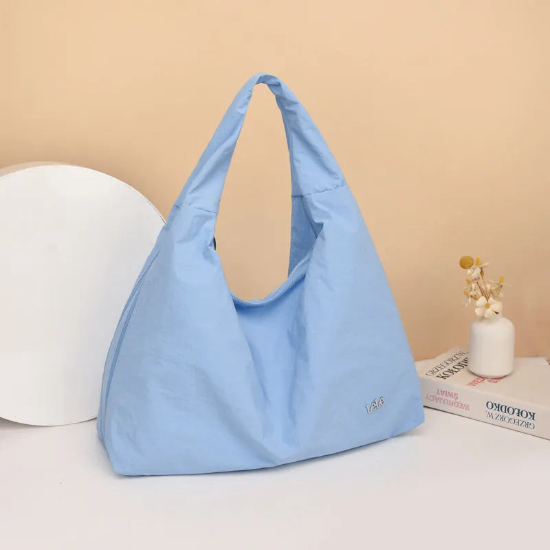 Women's heart-shaped nylon crossbody bag in black, yellow, khaki or blue colours