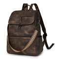 Retro college backpack in PU material with a curved shoulder strap shown in multiple colour options.