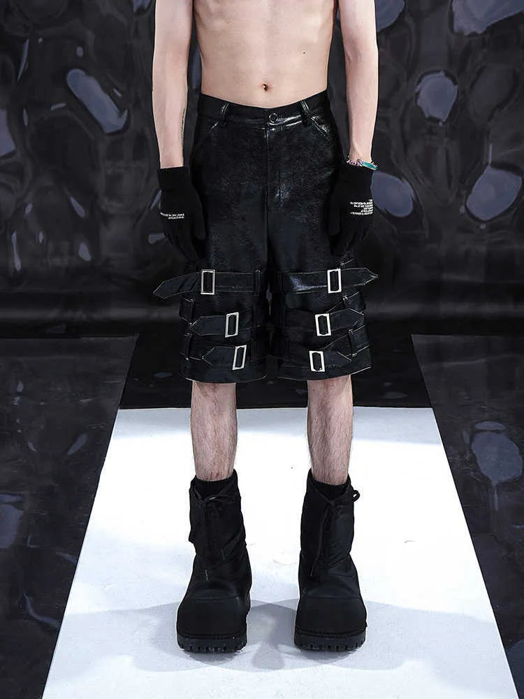 Men's black leather ring casual cropped pants in polycarbaminate fabric showing medium-low waist design