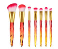 10 foundation brushes with crystal diamond handles in four colours: black, blue, red, and yellow
