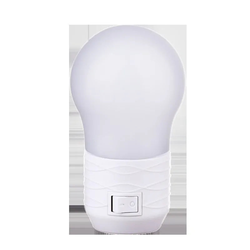 Plug-in bedside baby night feeding lamp in round modern design with white plastic shell