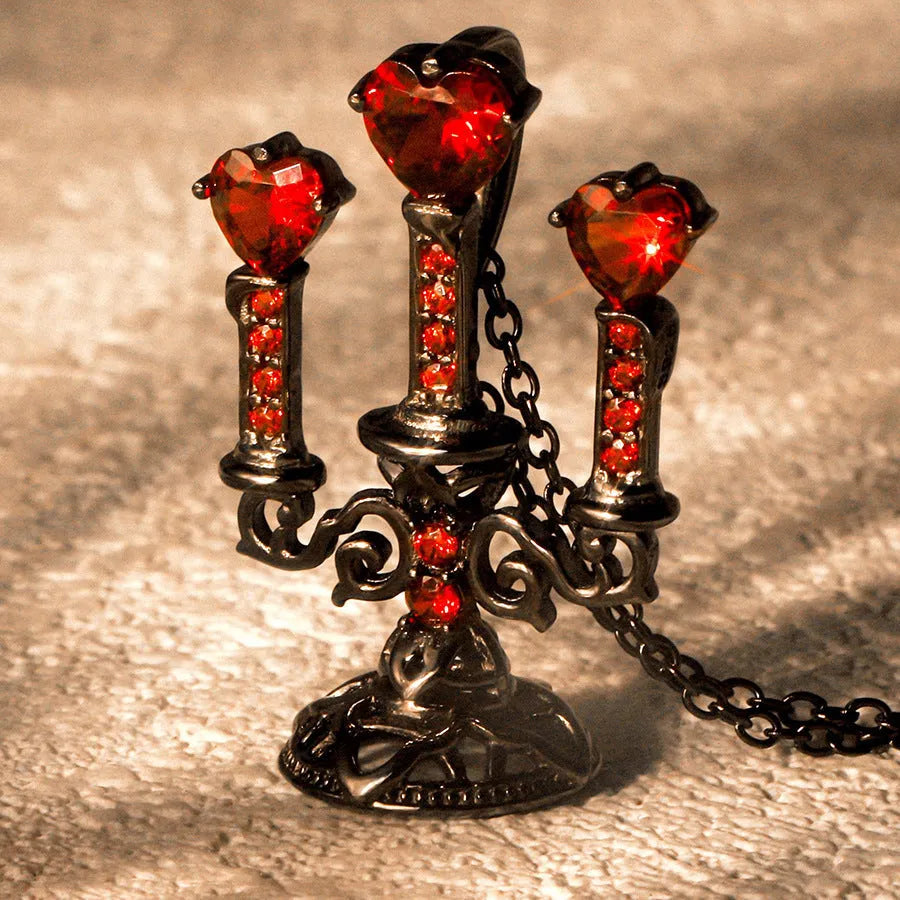 Women's vintage-style necklace with a detailed hollow candlestick pendant and cross chain in zinc alloy.