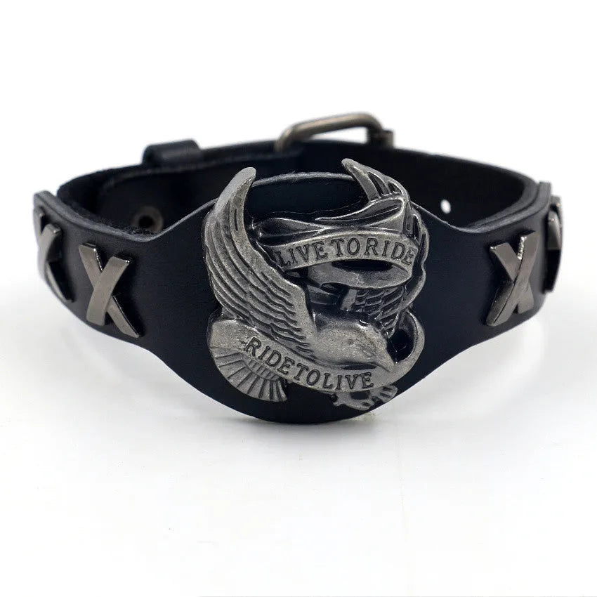 Black geometric bracelet with an alloy eagle watch-buttom on a leather strap.