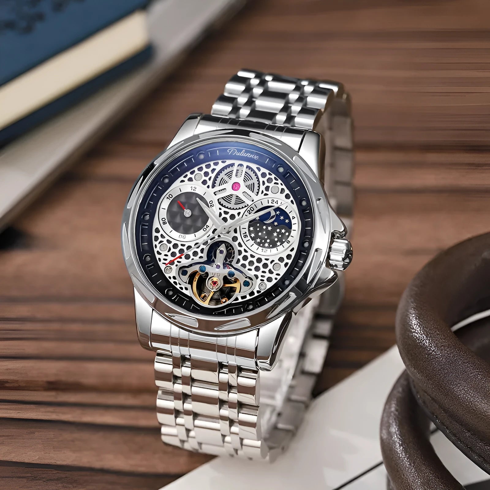 Men's automatic watch with luminous hands on a steel bracelet, black dial, and waterproof case.