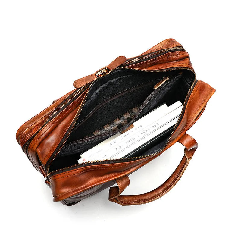 Vintage style leather men's briefcase with multiple internal pockets and 42x15x29cm dimensions