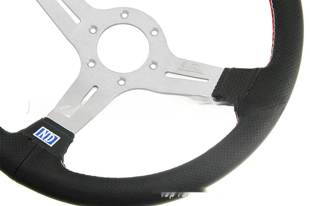 14-inch leather steering wheel with concave centre section in silver black colour with skeleton frame