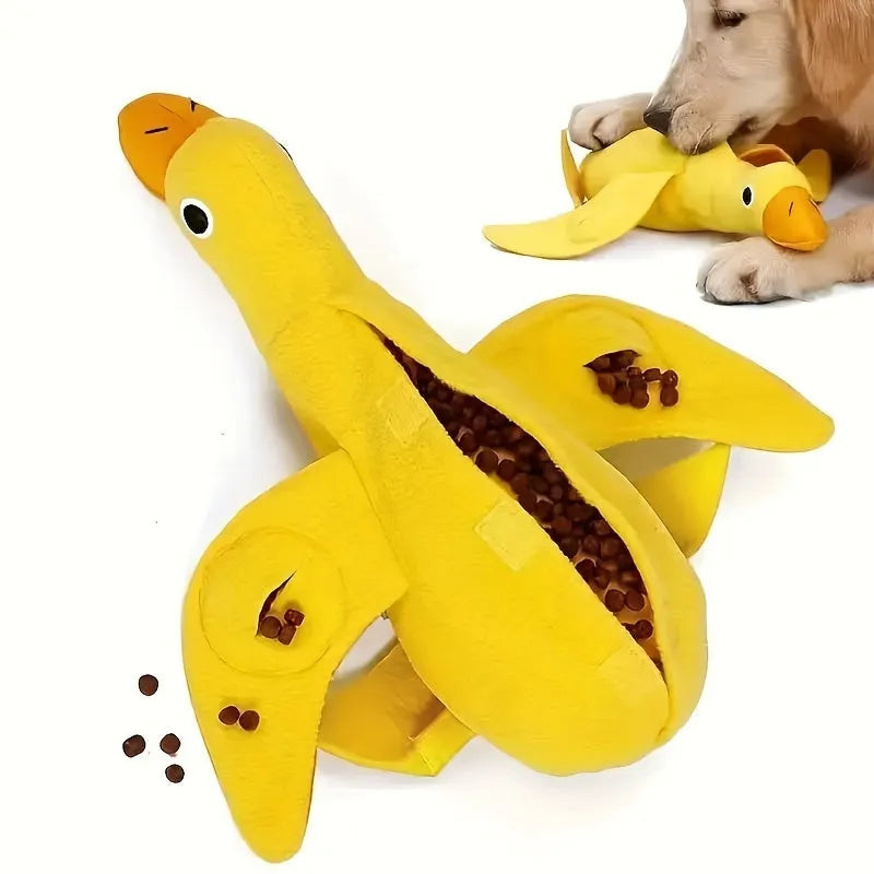 Yellow plush duck dog toy with treat holes and sound module for training and chewing