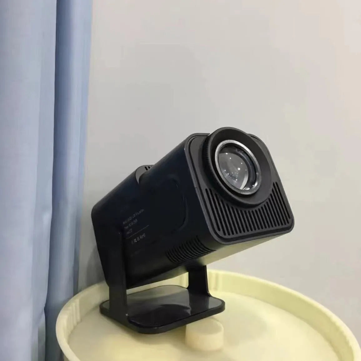 720p HD wireless home projector for gaming and screen projection on a table.