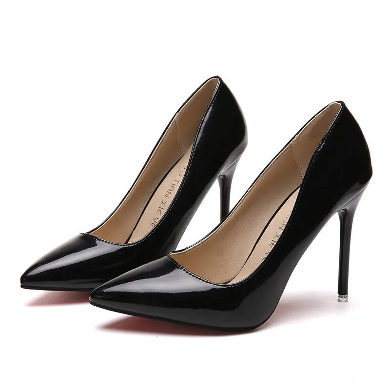 Women's pointed toe pumps with a high stiletto heel in apricot colour on a rubber sole.