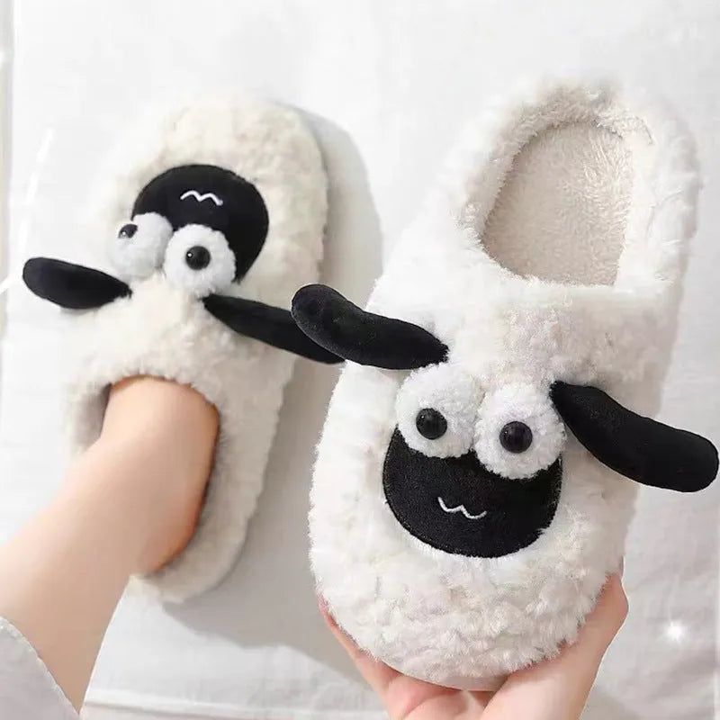 Slip-on thermal cotton slippers in brown colour with a suede upper and PVC sole.