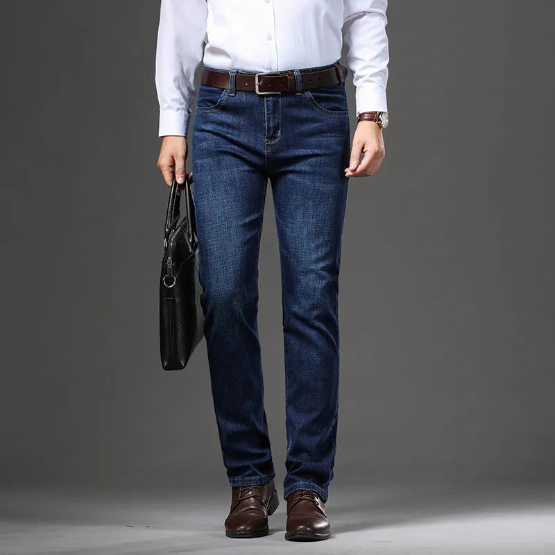 Men's black straight-leg stretch jeans with mid-waist and zip closure on plus size model