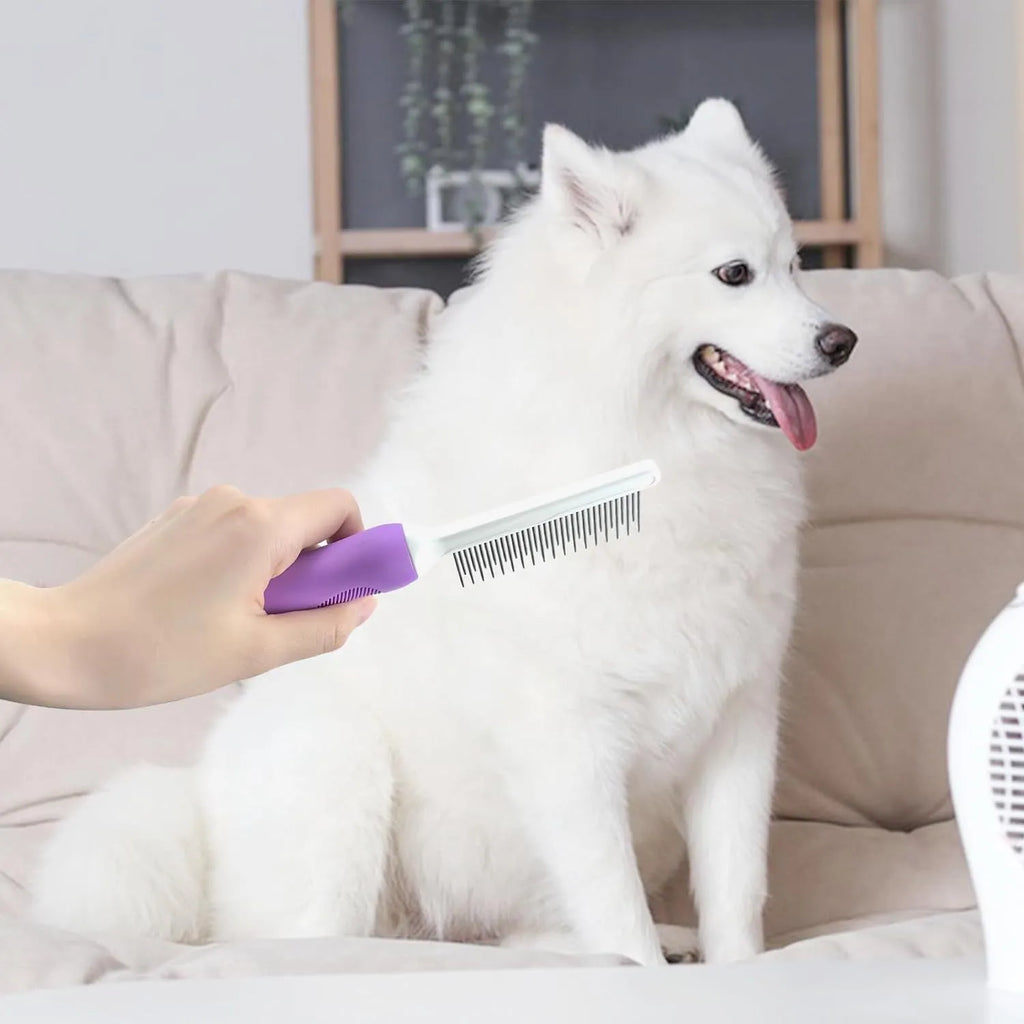 Purple handled pet grooming comb with long and short stainless steel teeth for detangling dog and cat fur.