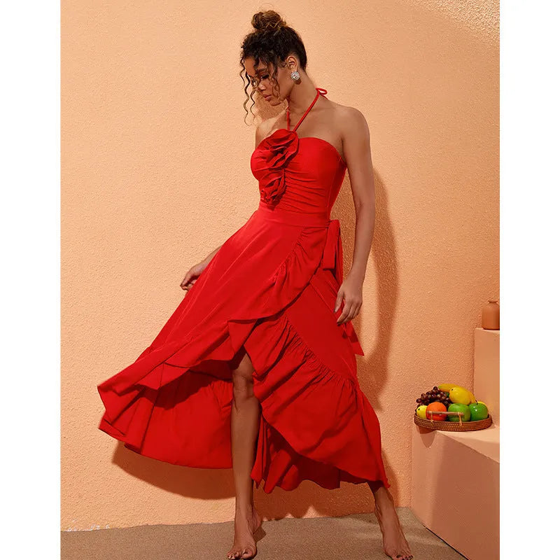Red women's V-neck one-piece swimsuit with detachable flower and matching skirt on beach