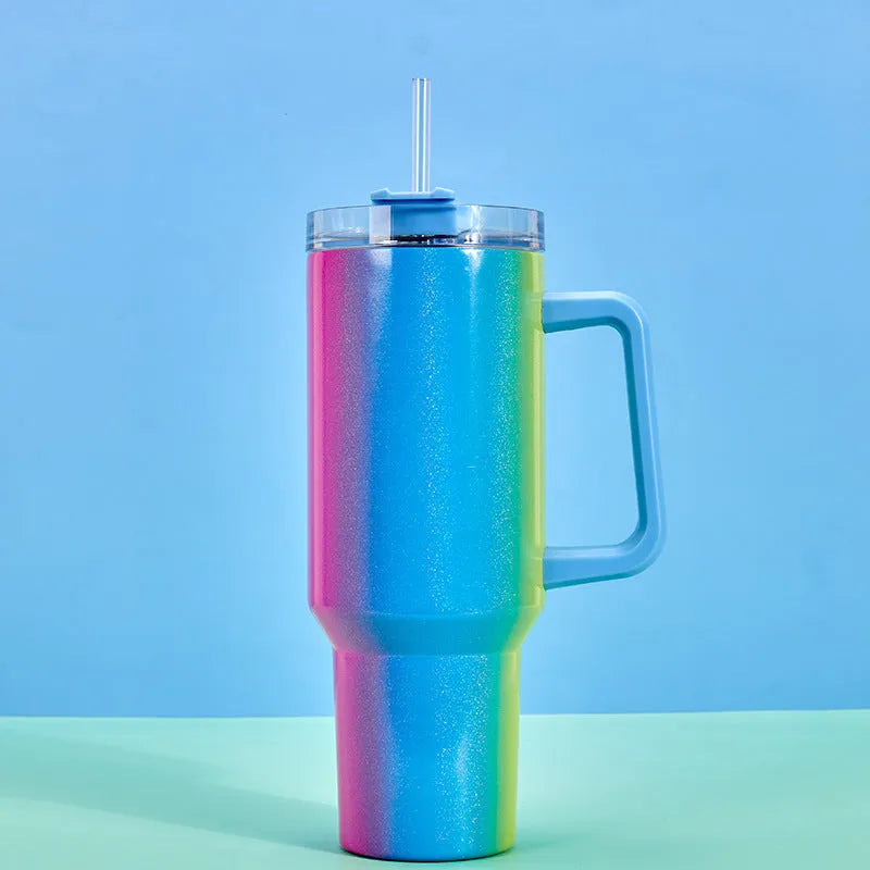 Large stainless steel vacuum insulated cup in a gradient colour option showing its height and simple style.