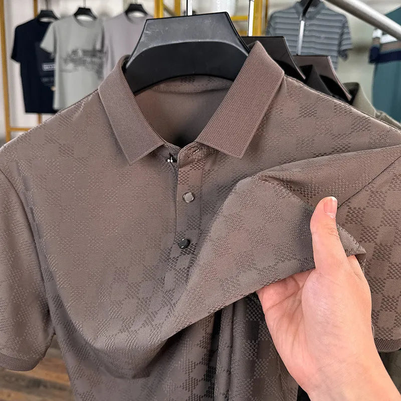 Man wearing a black rhombus weave thin ice silk short sleeve T-shirt with a slit detail.