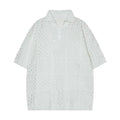 Short-sleeved polo shirt in loose cardigan style for teenagers, available in black or white colours