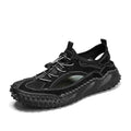 Men's black sports sandal with leather mesh upper, elastic band, and textured rubber sole.
