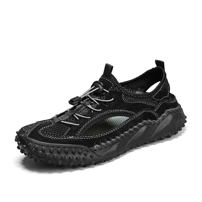 Men's black sports sandal with leather mesh upper, elastic band, and textured rubber sole.