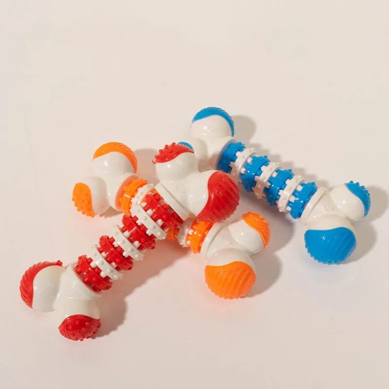 Small blue bone-shaped dog toy with textured chewable ends and central treat compartment
