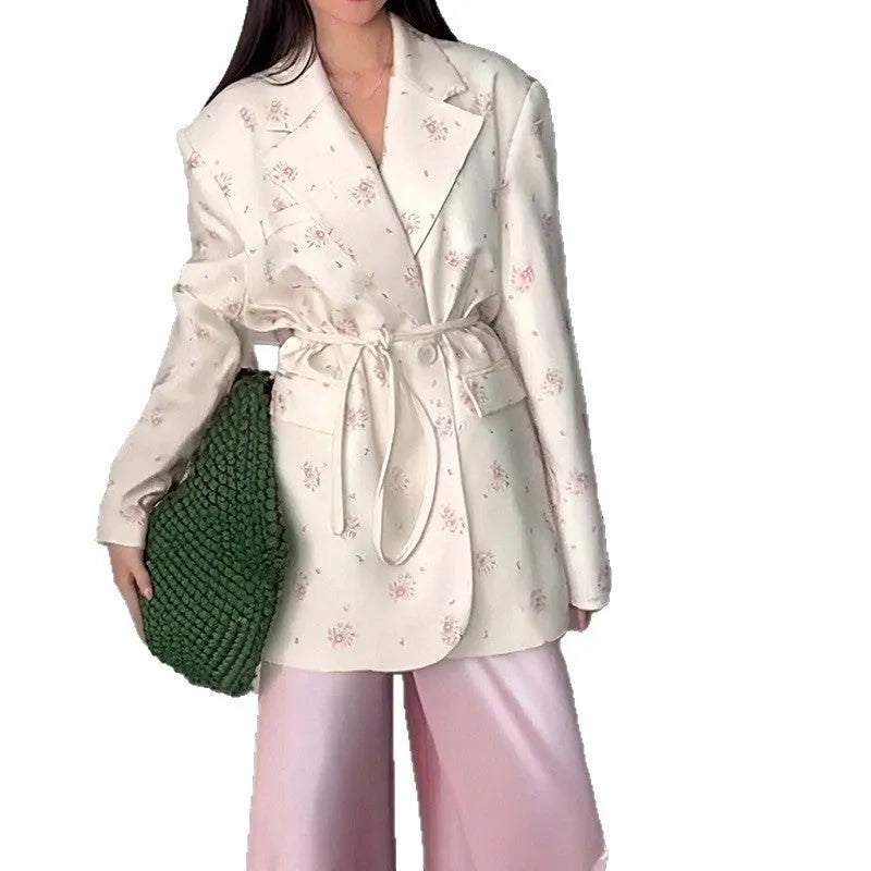 Women's collar lace-up waist-tight suit jacket in polyester fabric showing adjustable waist feature