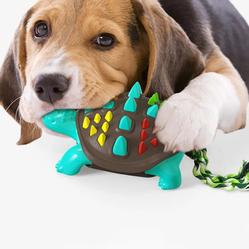 Natural rubber mint dog toothbrush chew toy with dinosaur knot tail in two-tone colours.