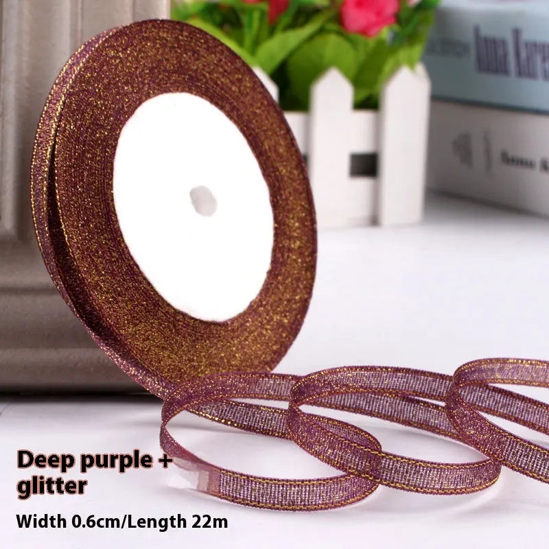 Roll of polyester gift ribbon showing 0.6cm width and multiple colour options including metallic finishes
