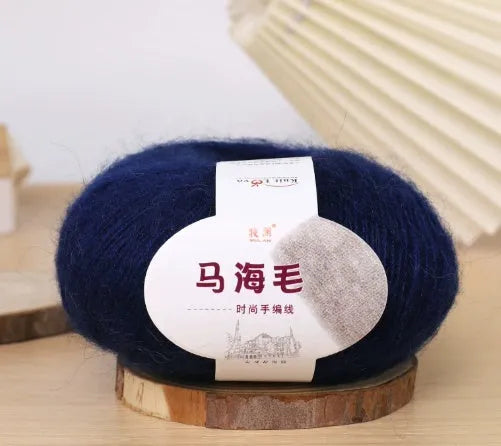 Single ball of mohair yarn in various colours for hand-woven DIY scarf knitting projects