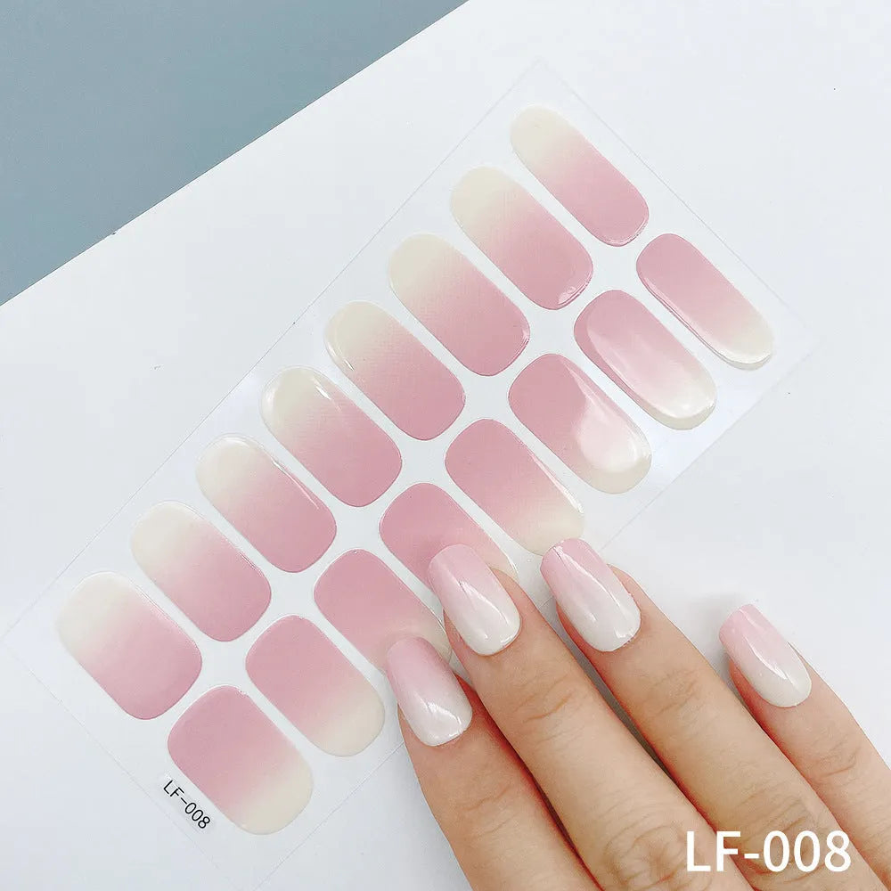 Sheet of 16 solid colour nail art sticker designs including cross, rose, and leopard print patterns.