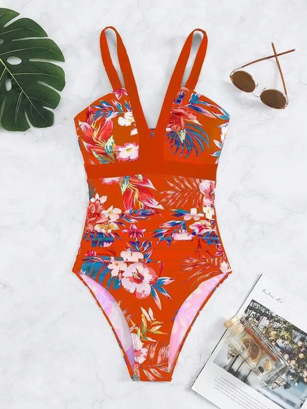 Backless floral one-piece swimsuit for women in a high-stretch polyester-spandex fabric.