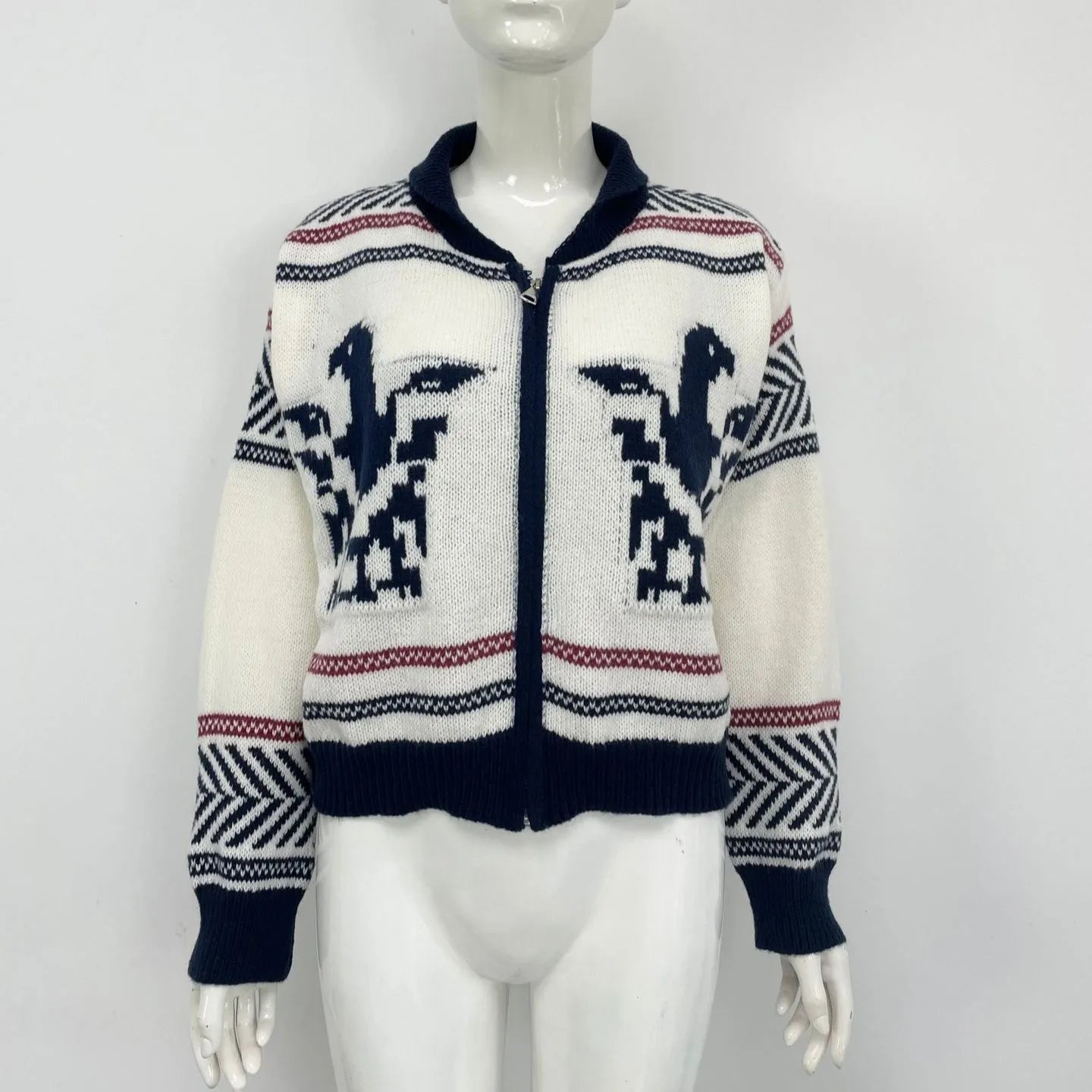 White women's zip cardigan with contrasting jacquard stripe pattern and a lapel collar.