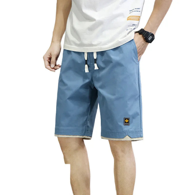 Men's loose-fit Korean-style casual beach shorts in blue, available in sizes up to 8XL.
