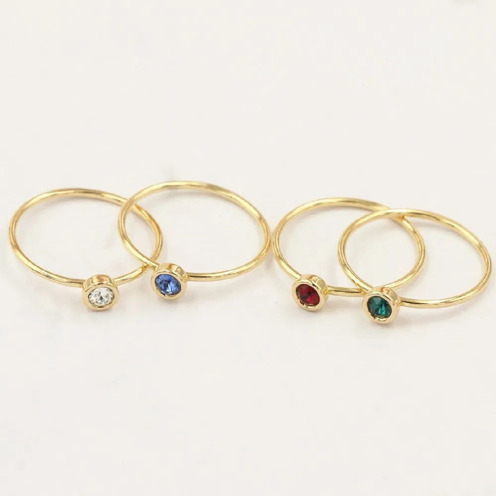 Women's knuckle ring with 14K gilded finish and zircon stone in choice of four colours