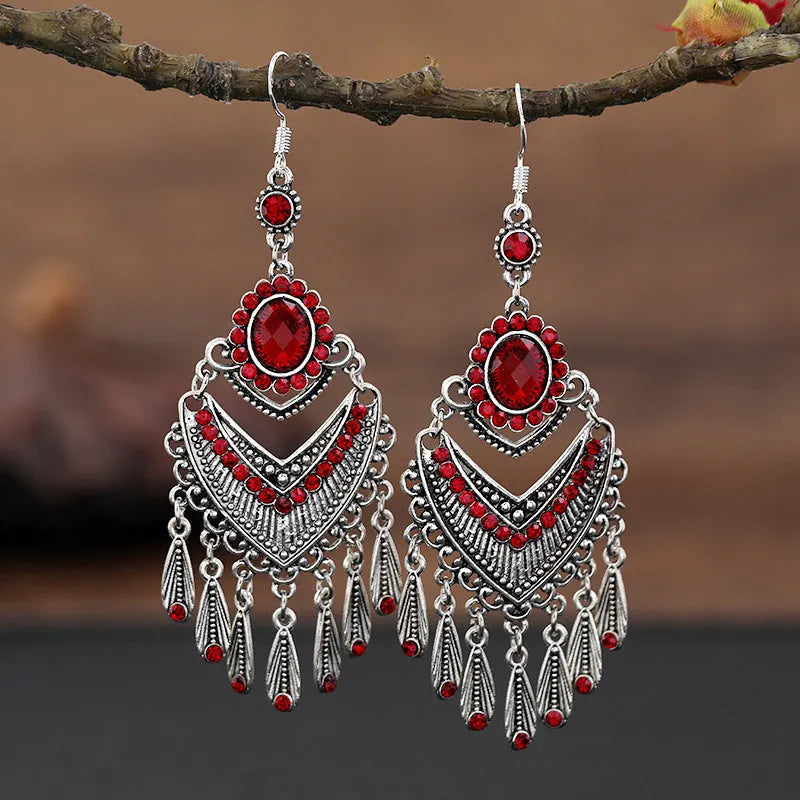 Purple retro drop earrings with dangling crystal fringe elements and ethnic style detailing