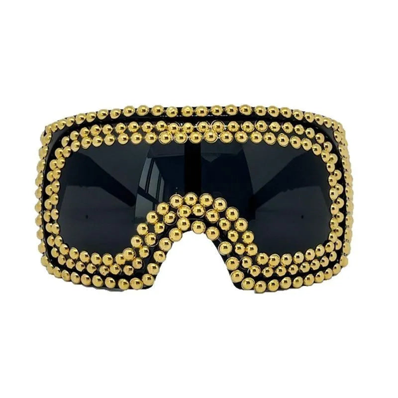 Men's punk sunglasses with large square frames and rivet detailing in silver or gold