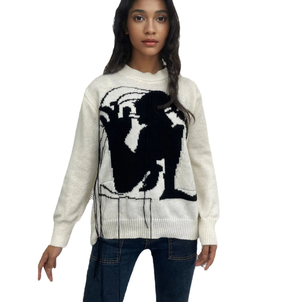 Women's grey alpaca wool sweater with tassel design and abstract pattern