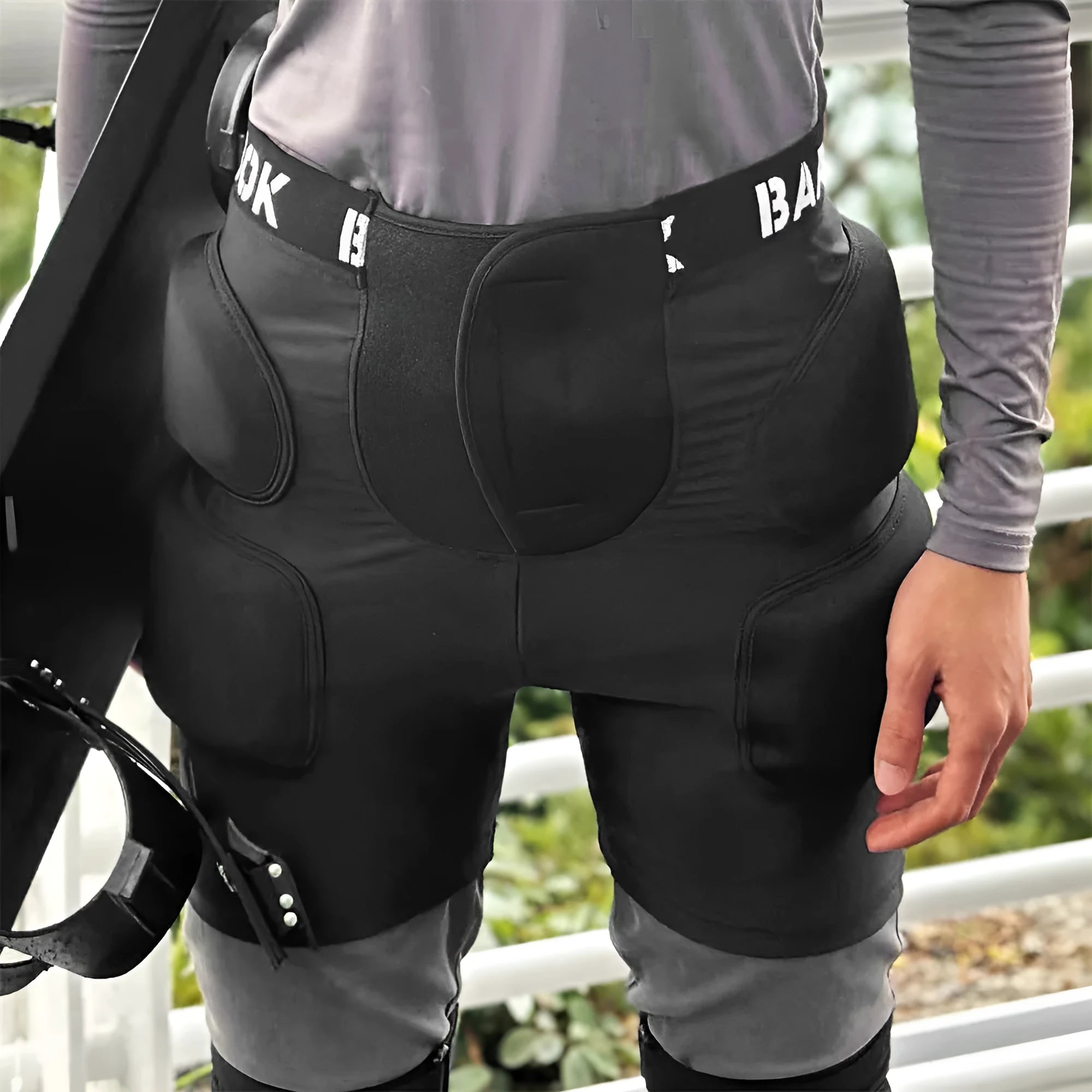 Black hip protection pad for roller skating and skateboarding made from spandex and NBR foam.