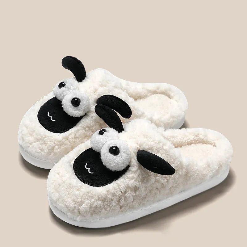 Slip-on thermal cotton slippers in brown colour with a suede upper and PVC sole.