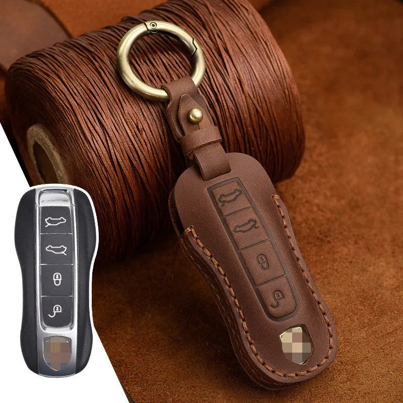 Genuine cowhide leather Porsche key case with retro bag-style buckle in blue or brown colour options
