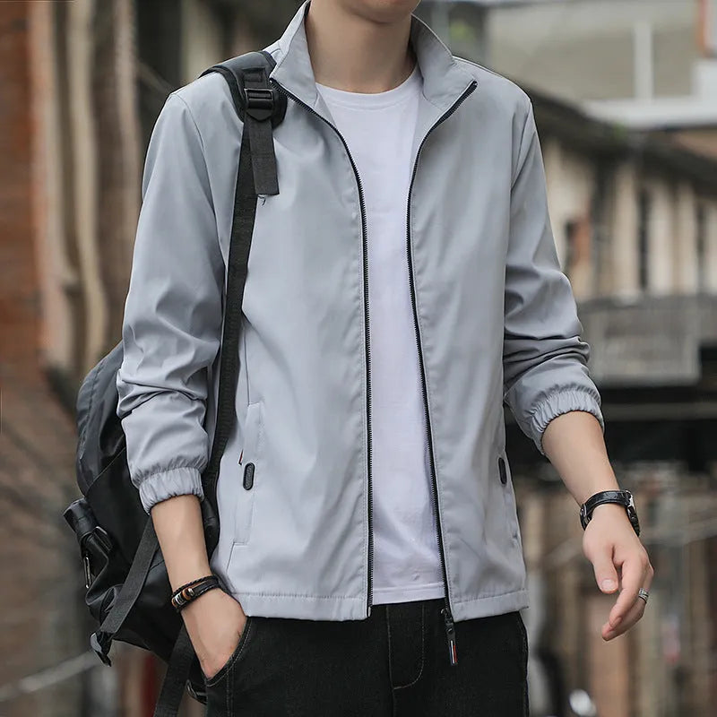 Men's Korean style loose lapel autumn jacket in black with zipper pockets