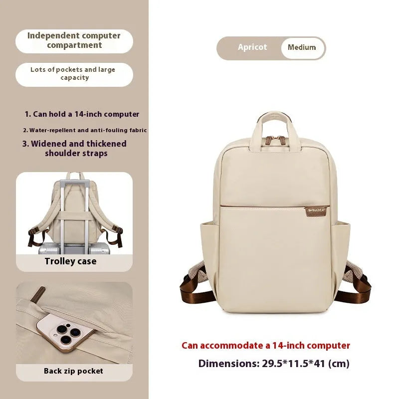 Nylon women's travel backpack in apricot colour showing front pockets and laptop compartment.