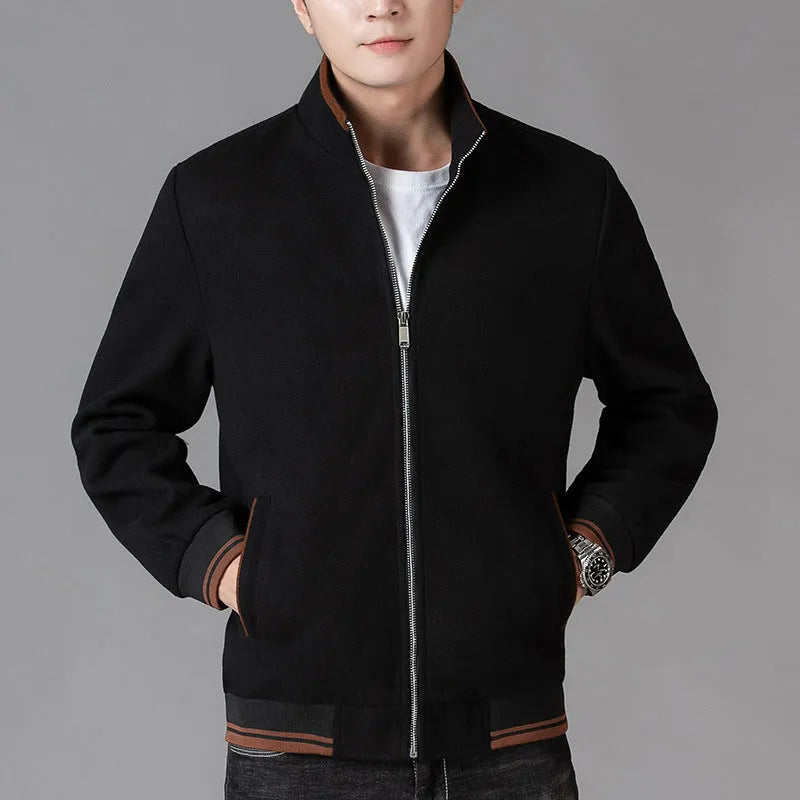 A grey men's sporty fleece jacket with long sleeves and a stick pocket, shown on a hanger.