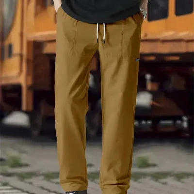 Men's light grey polyester trousers for spring and autumn casual wear, shown in Asian sizing.