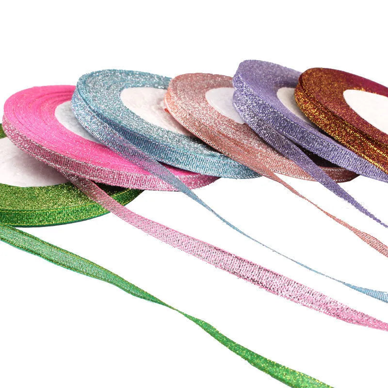 Roll of polyester gift ribbon showing 0.6cm width and multiple colour options including metallic finishes