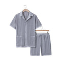 Women's thin polyester beach shorts suit with a see-through cardigan and matching shorts in lake blue.