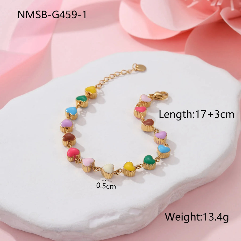 Heart-shaped stainless steel bracelet with colourful oil pattern in gold or steel finish