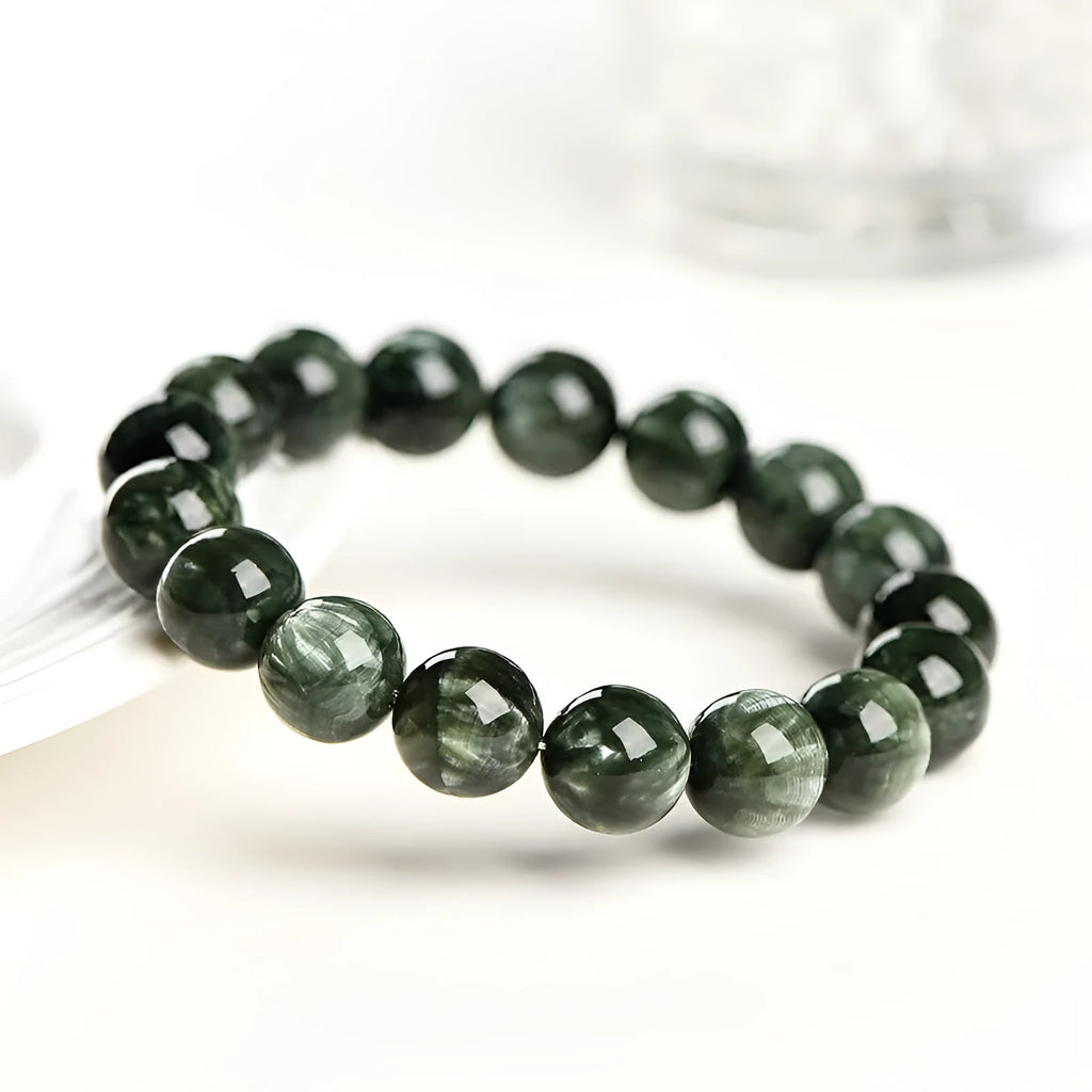 Natural green dragon crystal bracelet with 8-9mm round beads and ruyi geometric design